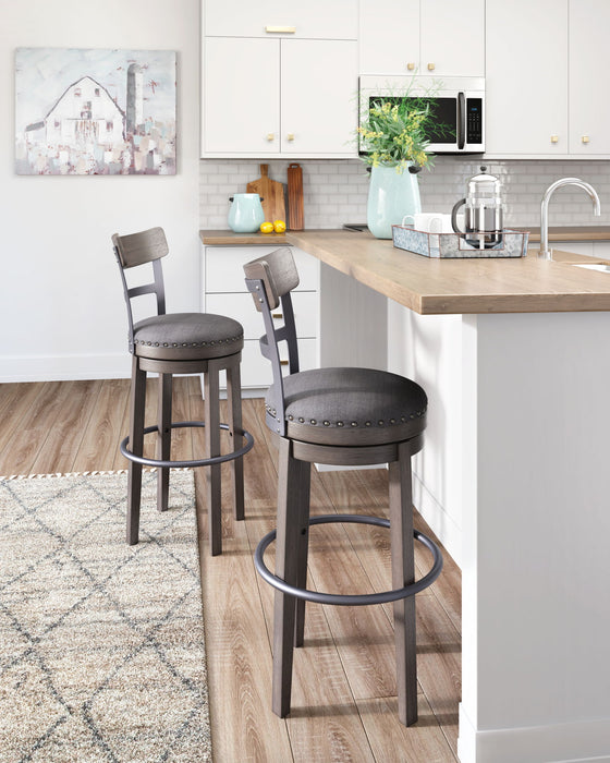 Caitbrook - Gray - Tall UPH Swivel Barstool - Tallahassee Discount Furniture (FL)