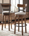 Valebeck - Tall Upholstered Swivel Barstool - Tallahassee Discount Furniture (FL)