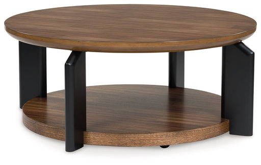 Kraeburn - Brown / Black - Round Cocktail Table - Tallahassee Discount Furniture (FL)