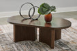 Korestone - Dark Brown - Oval Cocktail Table - Tallahassee Discount Furniture (FL)