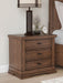 Taffenbrook - Medium Brown - Three Drawer Night Stand - Tallahassee Discount Furniture (FL)