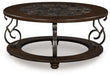 Frallyn - Dark Brown - Round Cocktail Table - Tallahassee Discount Furniture (FL)