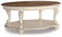 Realyn - Oval Cocktail Table - White / Brown - Tallahassee Discount Furniture (FL)