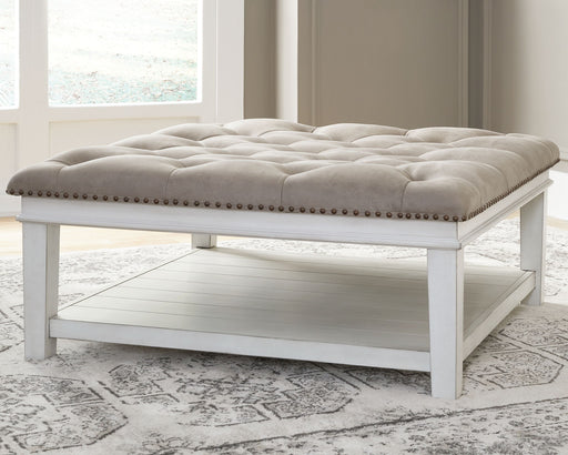 Kanwyn - Whitewash - Uph Ottoman Cocktail Table - Tallahassee Discount Furniture (FL)
