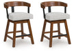 Ralene - Medium Brown - Upholstered Swivel Barstool (Set of 2) - Tallahassee Discount Furniture (FL)