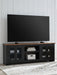 Wildenauer - Brown / Black - XL TV Stand With Fireplace Option - Tallahassee Discount Furniture (FL)