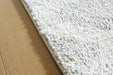 Unawick - Rug - Tallahassee Discount Furniture (FL)