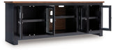 Wildenauer - Brown / Black - XL TV Stand With Fireplace Option - Tallahassee Discount Furniture (FL)